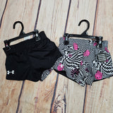 UNDER ARMOUR REVERSIBLE SHORT GROOVY BLK&PINK/SOLIDBLACK